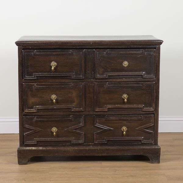 A 17TH CENTURY CONTINENTAL OAK THREE DRAWER CHEST