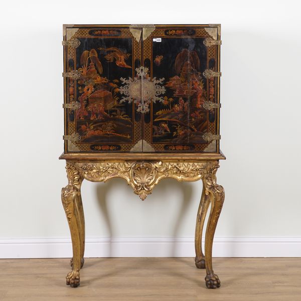 A GEORGE II STYLE CHINOISERIE DECORATED CABINET ON STAND