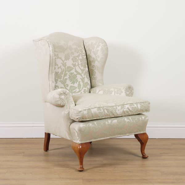 AN EARLY 18TH CENTURY STYLE WINGBACK EASY ARM CHAIR