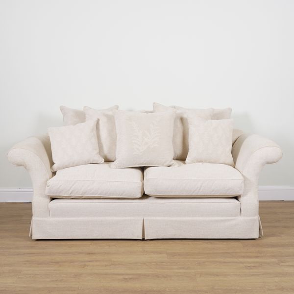 A MODERN THREE SEAT SOFA