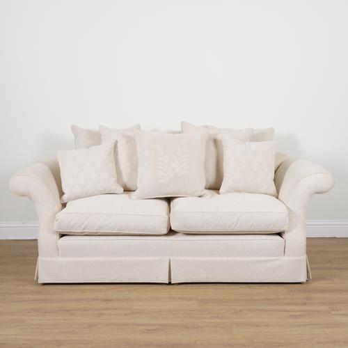 A MODERN THREE SEAT SOFA