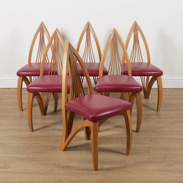 THE EDWARD BARNSLEY WORKSHOP; A SET OF SIX ELM POINTED ARCH BACK DINING CHAIRS (6)