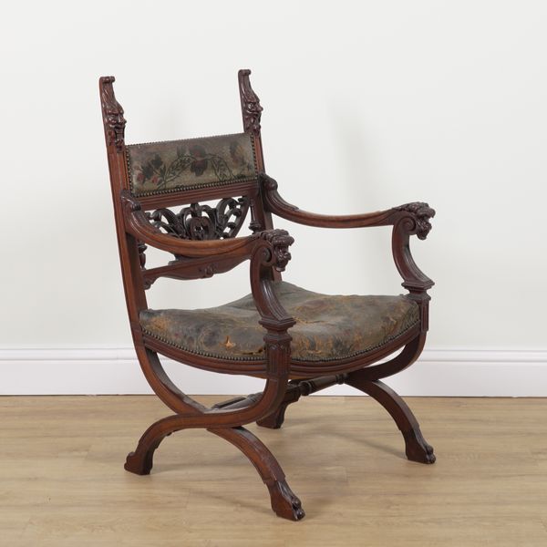 A 19TH CENTURY CONTINENTAL WALNUT PAINTED LEATHER OPEN ARMCHAIR