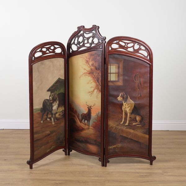 AN ART NOVEAU CARVED MAHOGANY FRAMED THREE FOLD SCREEN