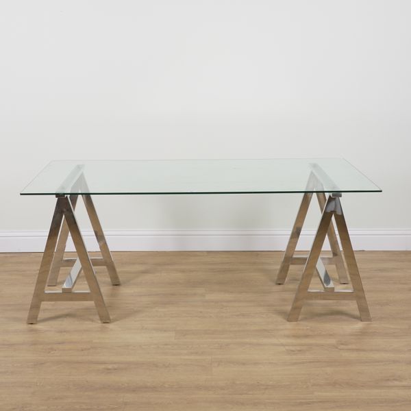 A MODERN CHROME AND GLASS DINING TABLE