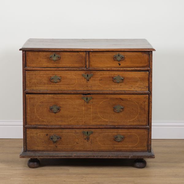 AN EARLY 18TH CENTURY INLAID WALNUT FIVE DRAWER CHEST