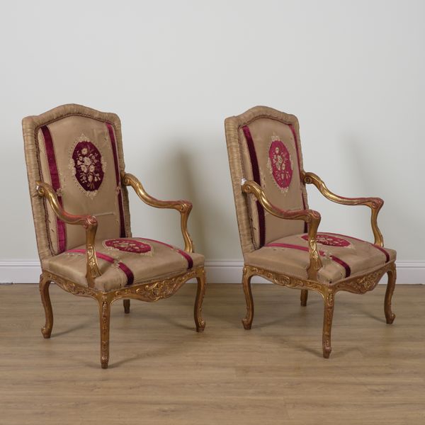 A PAIR OF 19TH CENTURY GILT FRAMED OPEN ARMCHAIRS (2)