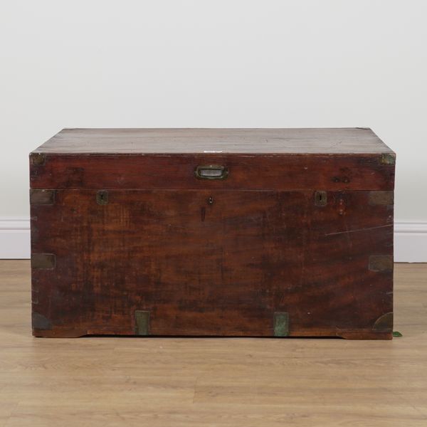 A 19TH CENTURY BRASS BOUND CAMPHOR WOOD TRUNK