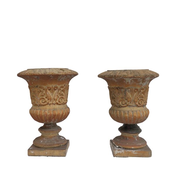 A PAIR OF NEOCLASSICAL STYLE COMPOSITE CAMPANA SHAPED URNS (2)