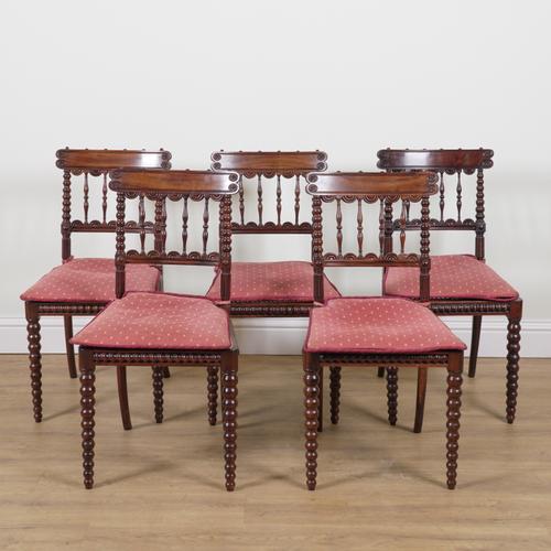 A SET OF FOUR REGENCY ROSEWOOD BAR BACK DINING CHAIRS (5)