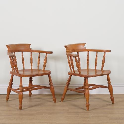 A PAIR OF 20TH CENTURY BEECH AND ELM SEATED BOW BACK ARMCHAIRS (2)