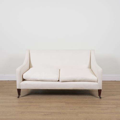 A MODERN SQUARE BACK TWO SEAT SOFA