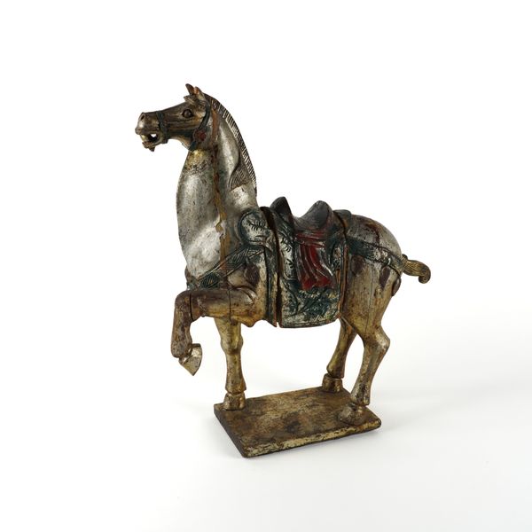 A MODERN ASIAN STYLE POLYCHROME PAINTED WOODEN MODEL OF A HORSE