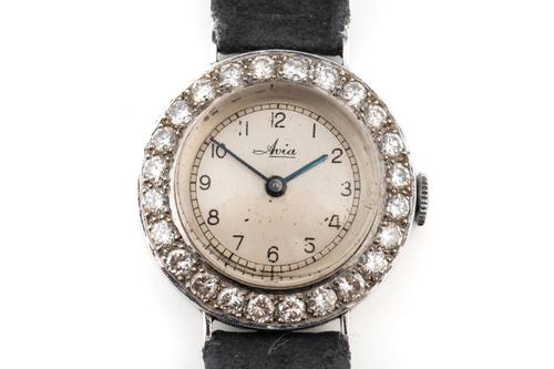 AN AVIA DIAMOND SET LADY'S DRESS WRISTWATCH