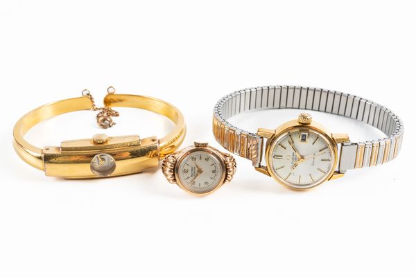 A ROTARY 9CT GOLD CASED LADY'S RING WATCH AND TWO FURTHER LADY'S WATCHES (3)