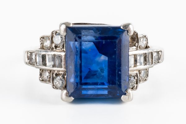 A SAPPHIRE AND DIAMOND RING