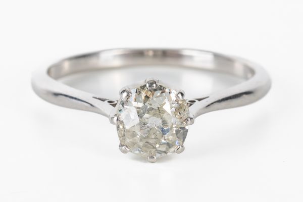 A PLATINUM AND DIAMOND SINGLE STONE RING