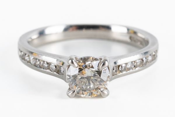 A PLATINUM AND DIAMOND RING