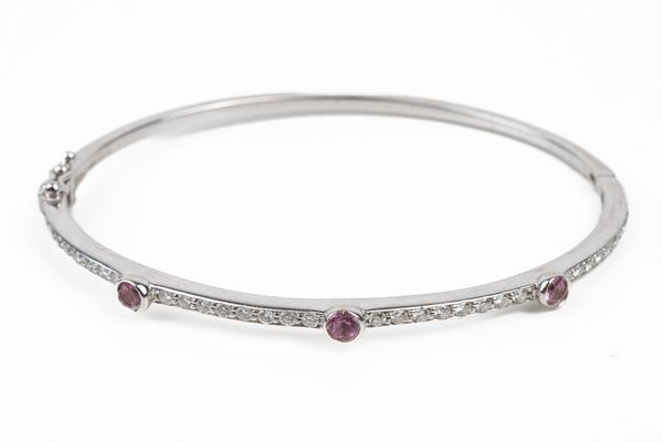 A PINK SAPPHIRE AND DIAMOND BANGLE