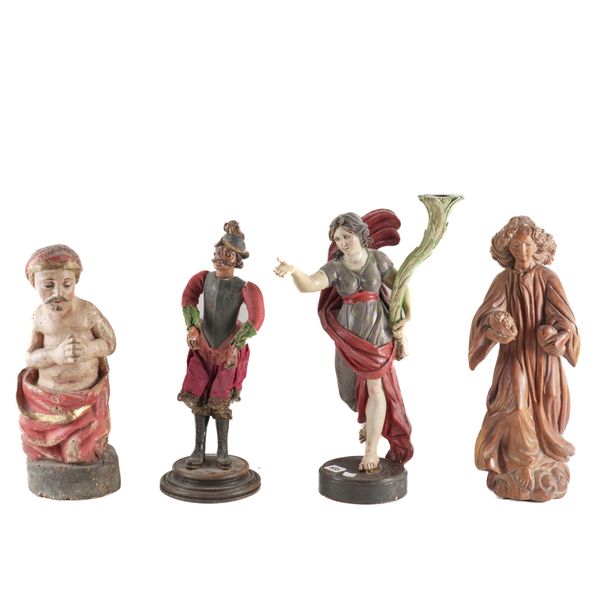 A GROUP OF CONTINENTAL POLYCHROME CARVED WOOD FIGURES  (4)