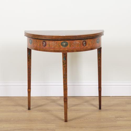 A GEORGE III POLYCHROME PAINTED SATINWOOD AND AMBOYNA DEMI-LUNE CARD TABLE