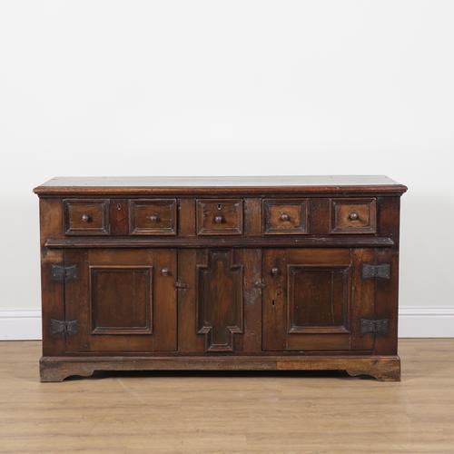 A 17TH CENTURY OAK GEOMETRIC MOULDED DRESSER BASE