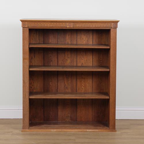 AN OAK FLOOR STANDING OPEN BOOKSHELF