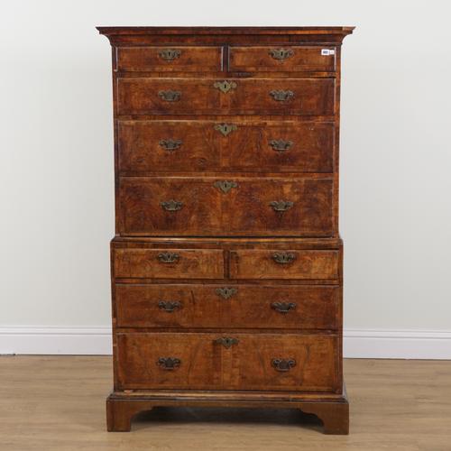 A MID 18TH CENTURY FIGURED WALNUT NINE DRAWER CHEST ON CHEST