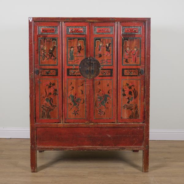 A RED LACQUERED CHINESE FOUR DOOR CABINET