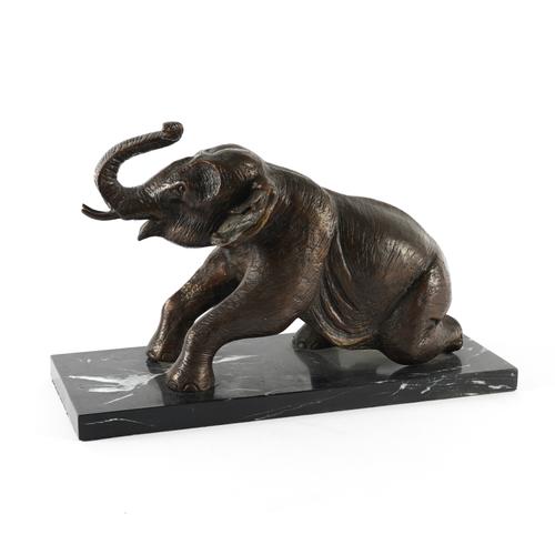 A BRONZE MODEL OF AN ELEPHANT