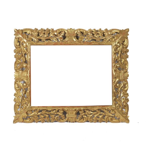 A GILT FRAMED RECTANGULAR WALL MIRROR