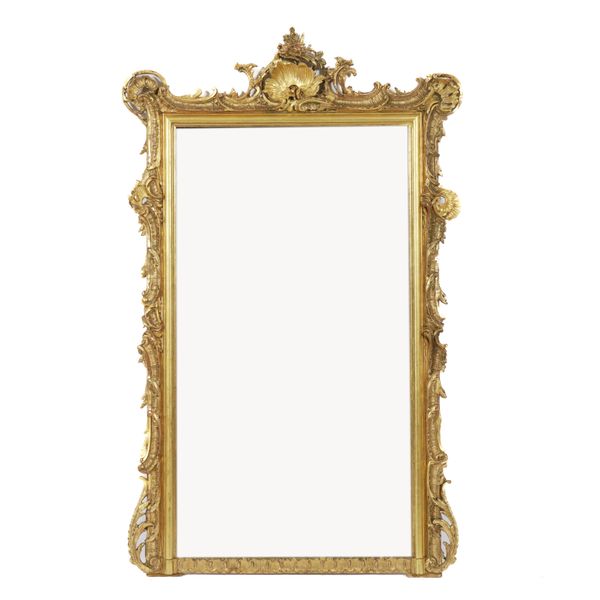 A 19TH CENTURY RECOCO REVIVAL GILT FRAMED RECTANGULAR WALL MIRROR