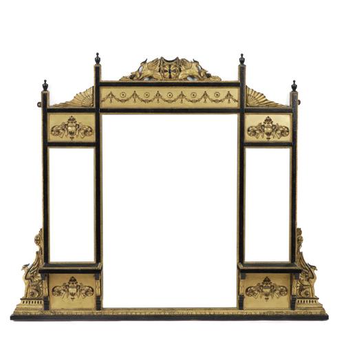 A VICTORIAN EBONISED AND PARCEL GILT DECORATED OVERMANTEL MIRROR