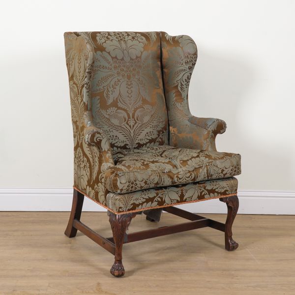 AN 18TH CENTURY AND LATER IRISH WINGBACK ARMCHAIR