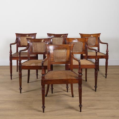A SET OF SIX 19TH CENTURY ANGLO INDIAN HARDWOOD OPEN ARMCHAIRS (6)