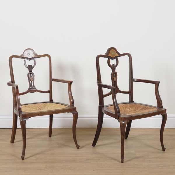 JAS SHOOLBRED; A PAIR OF EDWARDIAN MARQUETRY INLAID MAHOGANY RUSH SEAT OPEN ARMCHAIRS (2)