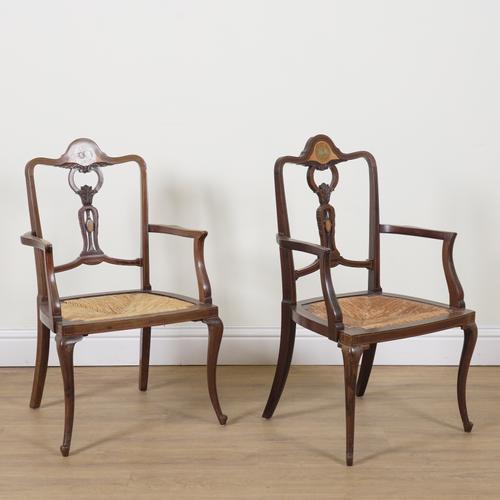 JAS SHOOLBRED; A PAIR OF EDWARDIAN MARQUETRY INLAID MAHOGANY RUSH SEAT OPEN ARMCHAIRS (2)
