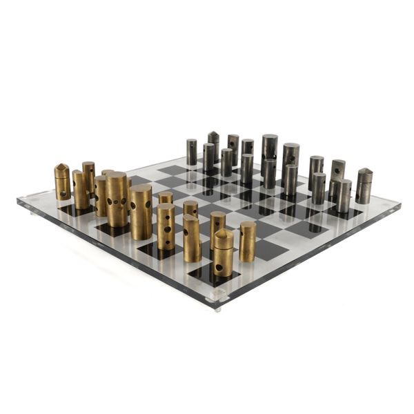 AN ABSTRACT POLISHED ALUMINIUM AND BRONZE  CHESS SET (33)
