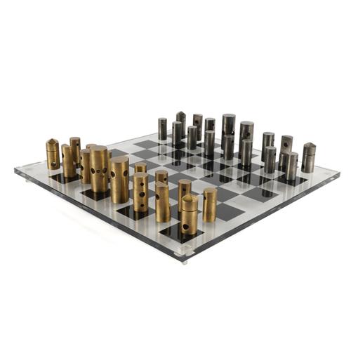 AN ABSTRACT POLISHED ALUMINIUM AND BRONZE  CHESS SET (33)