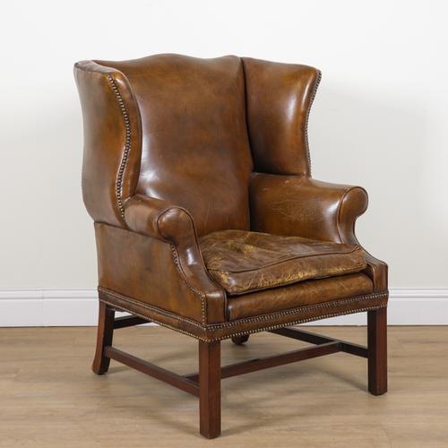 A GEORGE II STYLE WINGBACK ARMCHAIR