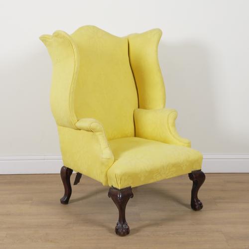 A GEORGE II STYLE WINGBACK ARMCHAIR