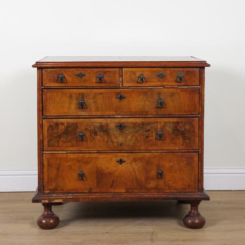 AN 18TH CENTURY FIGURED WALNUT CHEST OF DRAWERS
