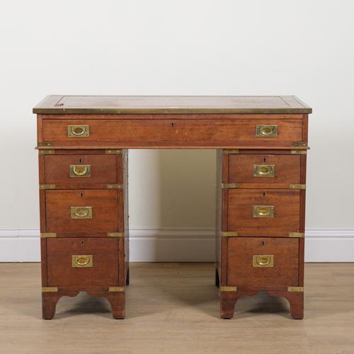 A BRASS BOUND MAHOGANY CAMPAIGN STYLE PEDESTAL DESK