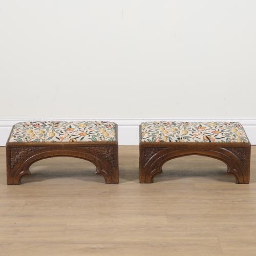 A PAIR OF VICTORIAN AND LATER GOTHIC REVIVAL RECTANGULAR FOOTSTOOLS (2)
