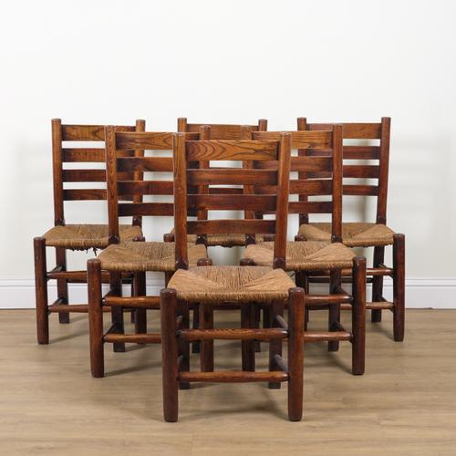 A SET OF SIX LATE 19TH CENTURY ASH LADDER BACK DINING CHAIRS (6)