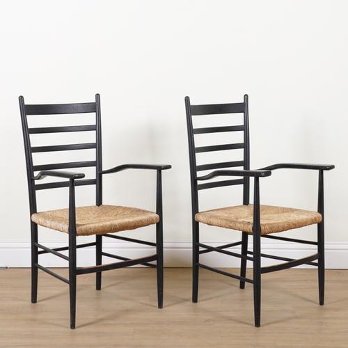 OTTO GERDAU FOR ROOKSMOOR MILL ITALY; A PAIR OF EBONISED ASH LADDERBACK OPEN ARMCHAIRS (2)