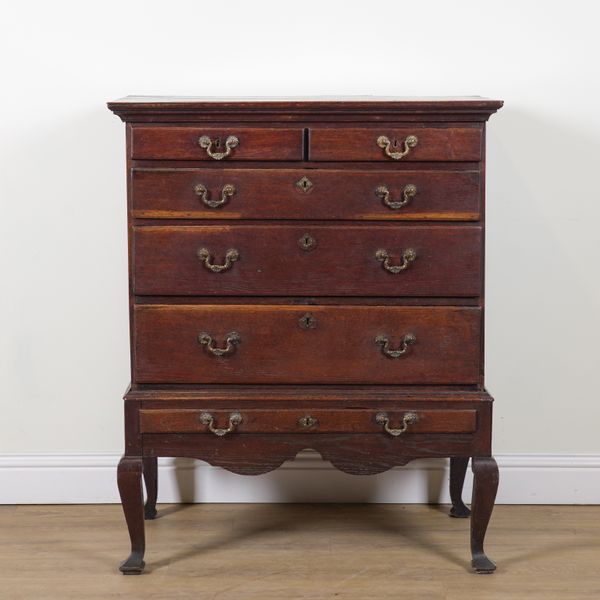 A MID 18TH CENTURY OAK CHEST ON STAND