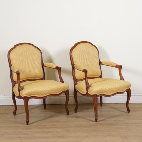 KINGCOME SOFA LTD; A PAIR OF LOUIS XV STYLE STAINED BEECH OPEN ARMCHAIRS (2)