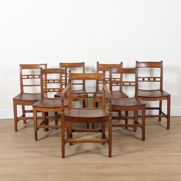 A MATCHED SET OF SEVEN ELM SUFFOLK BALL BACK DINING CHAIRS (7)