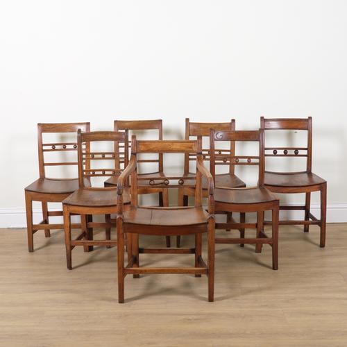 A MATCHED SET OF SEVEN ELM SUFFOLK BALL BACK DINING CHAIRS (7)